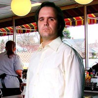 Vincent Gayle Solemn man with dark hair and eyebrows